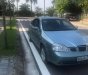 Daewoo Lacetti  1.8 MT 2004 - Cần bán gấp Daewoo Lacetti 1.8 MT sản xuất năm 2004, màu xanh lam, 94tr