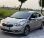 Kia K3   1.6 MT  2014 - Bán ô tô Kia K3 1.6 MT năm 2014, màu vàng cát, 350tr