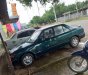 Mazda 323 1995 - Cần bán gấp Mazda 323 sản xuất 1995, xe nhập, màu xanh 