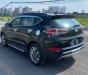 Hyundai Tucson 2017 - Cần bán xe Hyundai Tucson sản xuất 2017, màu đen, giá chỉ 705 triệu