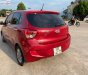 Hyundai Grand i10  1.2 AT  2015 - Bán Hyundai Grand i10 1.2 AT đời 2015, màu đỏ, xe nhập