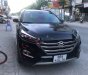 Hyundai Tucson     2019 - Cần bán gấp Hyundai Tucson sản xuất 2019, màu đen còn mới