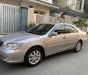 Toyota Camry 2004 - Bán Toyota Camry sản xuất 2004, màu bạc số tự động