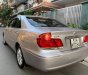 Toyota Camry 2004 - Bán Toyota Camry sản xuất 2004, màu bạc số tự động