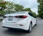 Mazda 3   1.5 AT 2015 - Bán Mazda 3 1.5 AT đời 2015, màu trắng còn mới