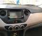 Hyundai Grand i10   2014 - Cần bán gấp Hyundai Grand i10 sản xuất 2014, màu trắng, nhập khẩu  