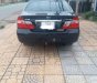 Toyota Camry 2002 - Cần bán gấp Toyota Camry đời 2002, màu đen