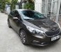 Kia K3   1.6 MT  2014 - Bán Kia K3 1.6 MT đời 2014, màu nâu còn mới