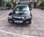 Mazda 323 2004 - Bán ô tô Mazda 323 2004, màu đen