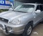 Hyundai Santa Fe   Gold   2004 - Bán Hyundai Santa Fe Gold đời 2004, màu bạc, xe nhập số tự động