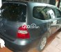 Nissan Livina  1.8 MT 2011 - Bán Nissan Livina 1.8 MT 2011, màu xanh lục xe gia đình