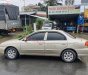 Kia Spectra   1.6 MT  2004 - Xe Kia Spectra 1.6 MT sản xuất năm 2004, màu vàng còn mới, 90 triệu