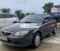 Mazda 323    2001 - Cần bán xe Mazda 323 đời 2001, màu xám, xe nhập còn mới
