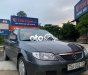 Mazda 323    2001 - Cần bán xe Mazda 323 đời 2001, màu xám, xe nhập còn mới