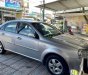 Daewoo Lacetti   EX  2010 - Cần bán lại xe Daewoo Lacetti EX đời 2010, màu bạc còn mới 