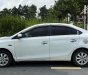 Toyota Vios   J   2014 - Cần bán Toyota Vios J đời 2014, màu trắng còn mới, giá tốt