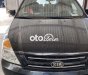 Kia Carnival 2011 - Cần bán gấp Kia Carnival sản xuất 2011, màu đen, nhập khẩu nguyên chiếc, giá chỉ 380 triệu