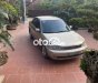 Ford Laser    2002 - Cần bán gấp Ford Laser 2002, màu vàng