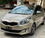 Kia Rondo   2.0 GATH  2015 - Bán Kia Rondo 2.0 GATH đời 2015, màu nâu còn mới, giá 480tr