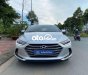 Hyundai Elantra  1.6 AT 2018 - Cần bán lại xe Hyundai Elantra 1.6 AT 2018, màu bạc giá cạnh tranh