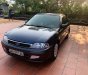 Ford Laser   Deluxe 1.6 MT 2002 - Xe Ford Laser Deluxe 1.6 MT năm 2002, màu xám