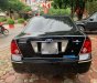 Ford Laser   1.8 Ghia  2005 - Cần bán Ford Laser 1.8 Ghia 2005, màu đen