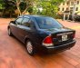 Ford Laser   Deluxe 1.6 MT 2002 - Xe Ford Laser Deluxe 1.6 MT năm 2002, màu xám