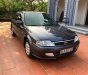 Ford Laser   Deluxe 1.6 MT 2002 - Xe Ford Laser Deluxe 1.6 MT năm 2002, màu xám