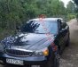 Daewoo Magnus   2.5 AT  2004 - Cần bán gấp Daewoo Magnus 2.5 AT 2004, màu đen còn mới  