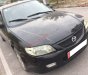 Mazda 323   Standard 1.6 MT 2001 - Cần bán lại xe Mazda 323 Standard 1.6 MT đời 2001, màu đen, giá chỉ 80 triệu