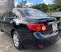 Toyota Corolla 1.8MT 2009 - Bán Toyota Corolla 1.8MT đời 2009, màu đen còn mới