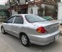 Kia Spectra   MT  2003 - Cần bán Kia Spectra MT năm sản xuất 2003, màu bạc xe gia đình