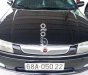 Mazda 323 1999 - Cần bán lại xe Mazda 323 năm 1999, màu đen, xe nhập, 130 triệu