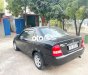 Mazda 323 2004 - Bán ô tô Mazda 323 đời 2004, màu đen, nhập khẩu nguyên chiếc, 158 triệu