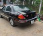 Kia Spectra 2004 - Cần bán gấp Kia Spectra đời 2004, màu đen, 85tr