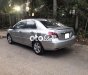 Toyota Vios E  2009 - Cần bán xe Toyota Vios E sản xuất năm 2009 màu ghi vàng, 215 triệu