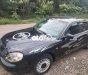 Daewoo Leganza 2003 - Cần bán xe Daewoo Leganza sản xuất 2003, màu đen, xe nhập giá cạnh tranh