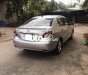 Toyota Vios E  2009 - Cần bán xe Toyota Vios E sản xuất năm 2009 màu ghi vàng, 215 triệu