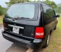 Kia Carnival   GS 2.5 AT  2009 - Cần bán Kia Carnival GS 2.5 AT năm sản xuất 2009, màu đen, 215 triệu