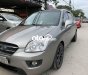 Kia Carens 2010 - Cần bán gấp Kia Carens đời 2010, màu xám