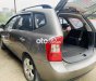 Kia Carens 2009 - Cần bán Kia Carens 2.0 MT đời 2009, màu xám còn mới