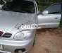 Daewoo Lanos MT 2003 - Cần bán gấp Daewoo Lanos MT sản xuất 2003, màu bạc, nhập khẩu