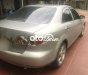 Mazda 6  MT 2004 - Cần bán gấp Mazda 6 MT 2004, màu vàng cát