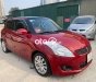 Suzuki Swift AT 2014 - Cần bán lại xe Suzuki Swift AT đời 2014, màu đỏ 