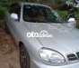 Daewoo Lanos MT 2003 - Cần bán gấp Daewoo Lanos MT sản xuất 2003, màu bạc, nhập khẩu