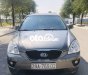 Kia Carens MT 2013 - Cần bán Kia Carens MT đời 2013, màu xám còn mới, 262 triệu