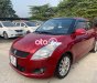 Suzuki Swift AT 2014 - Cần bán lại xe Suzuki Swift AT đời 2014, màu đỏ 