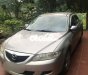 Mazda 6  MT 2004 - Cần bán gấp Mazda 6 MT 2004, màu vàng cát