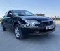 Mazda 323 2004 - Bán xe Mazda 323 đời 2004, màu đen xe gia đình