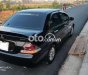 Mitsubishi Lancer 2004 - Cần bán lại xe Mitsubishi Lancer đời 2004, màu đen còn mới